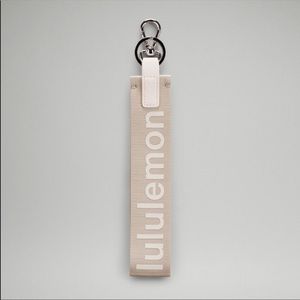 Lululemon never lost keychain in white opal